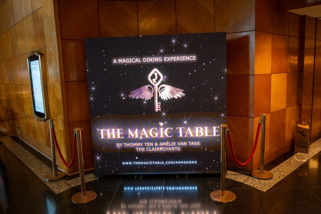 Signage for The Magic Table dining experience by The Clairvoyants at the Grand Hyatt Hong Kong