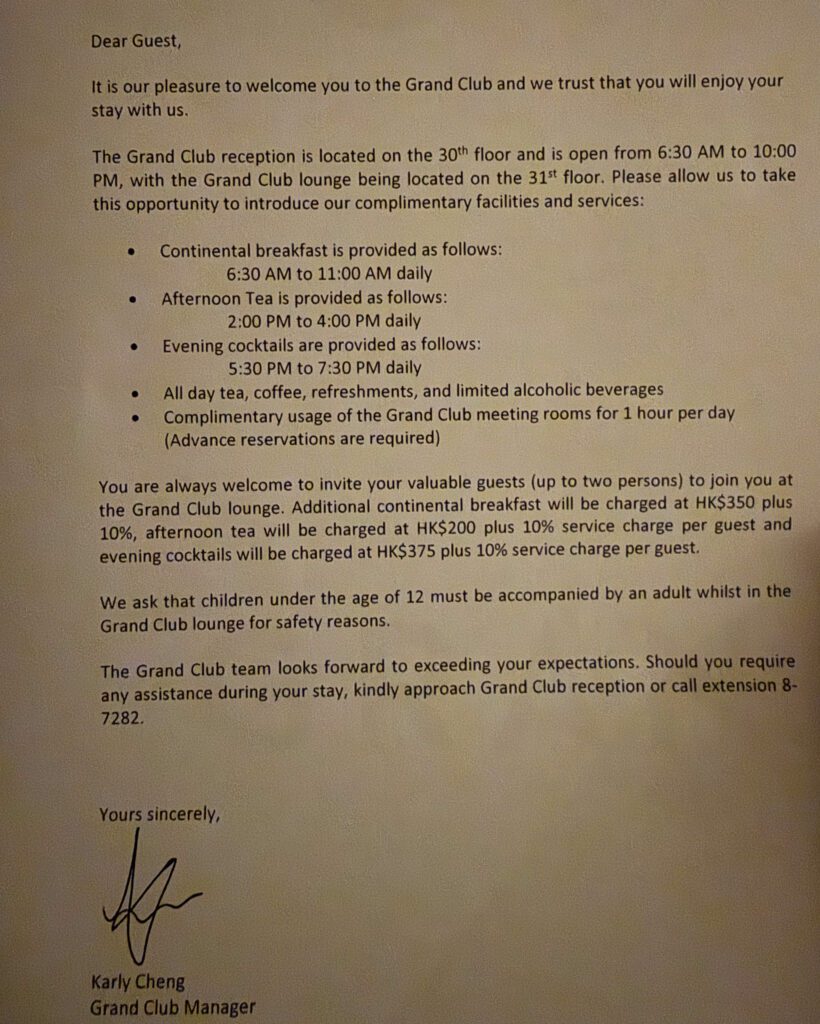 Welcome letter outlining Grand Club lounge hours and benefits at the Grand Hyatt Hong Kong