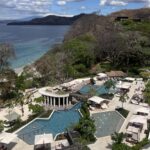 Aerial view of the pools and beach at Waldorf Astoria Cacique Costa Rica resort
