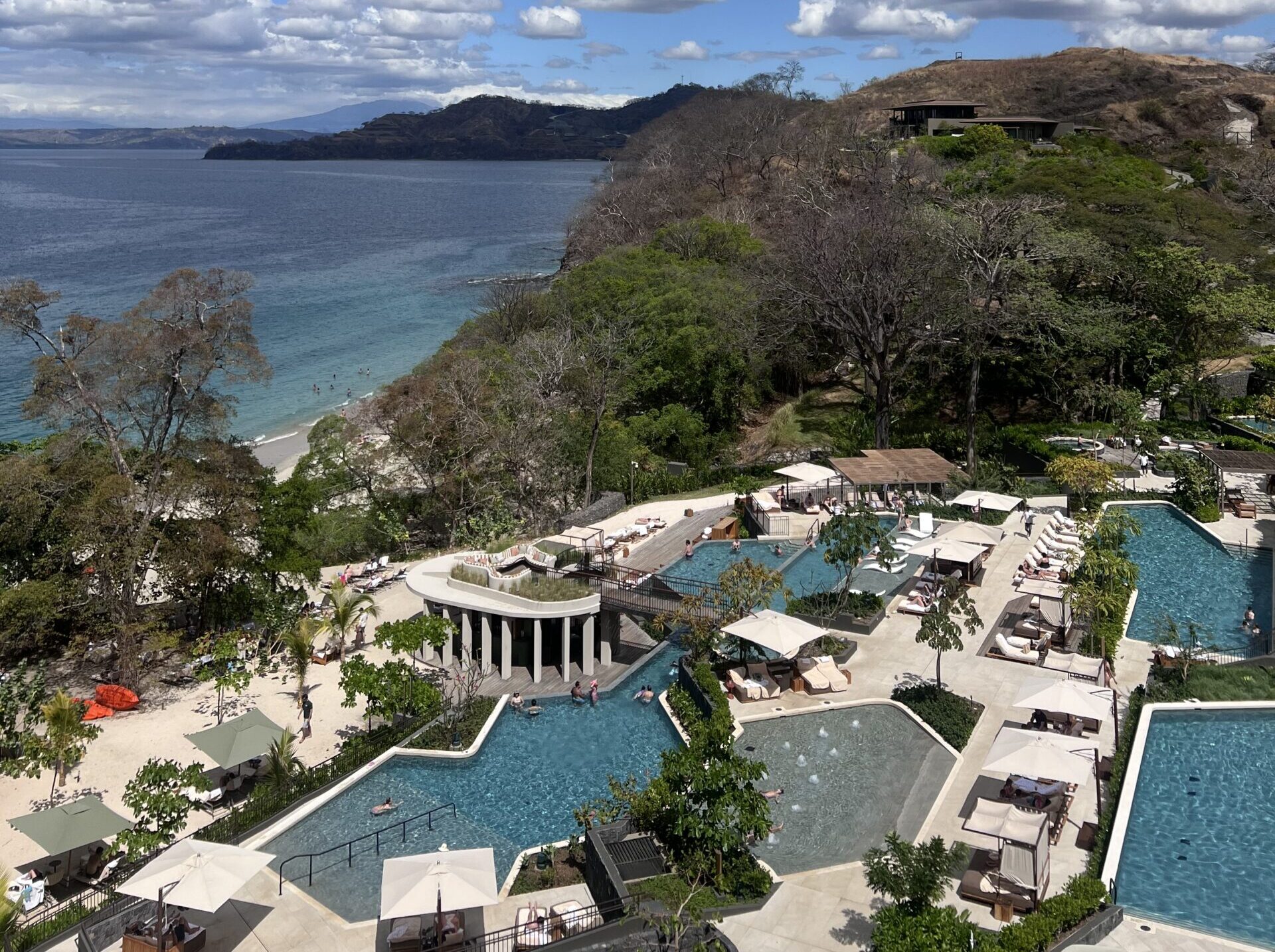 Aerial view of the pools and beach at Waldorf Astoria Cacique Costa Rica resort