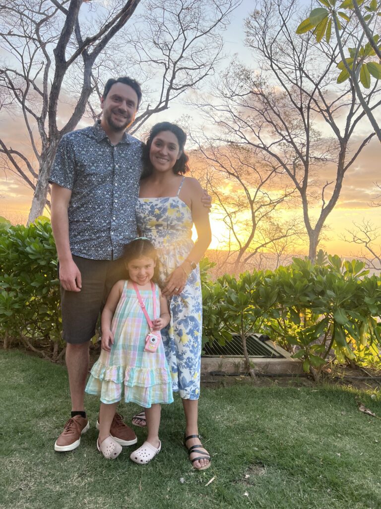 Family enjoying sunset views at Waldorf Astoria Cacique Costa Rica resort