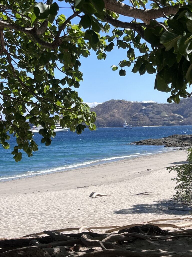 Sandy beach and ocean view near Waldorf Astoria Cacique Costa Rica in Guanacaste