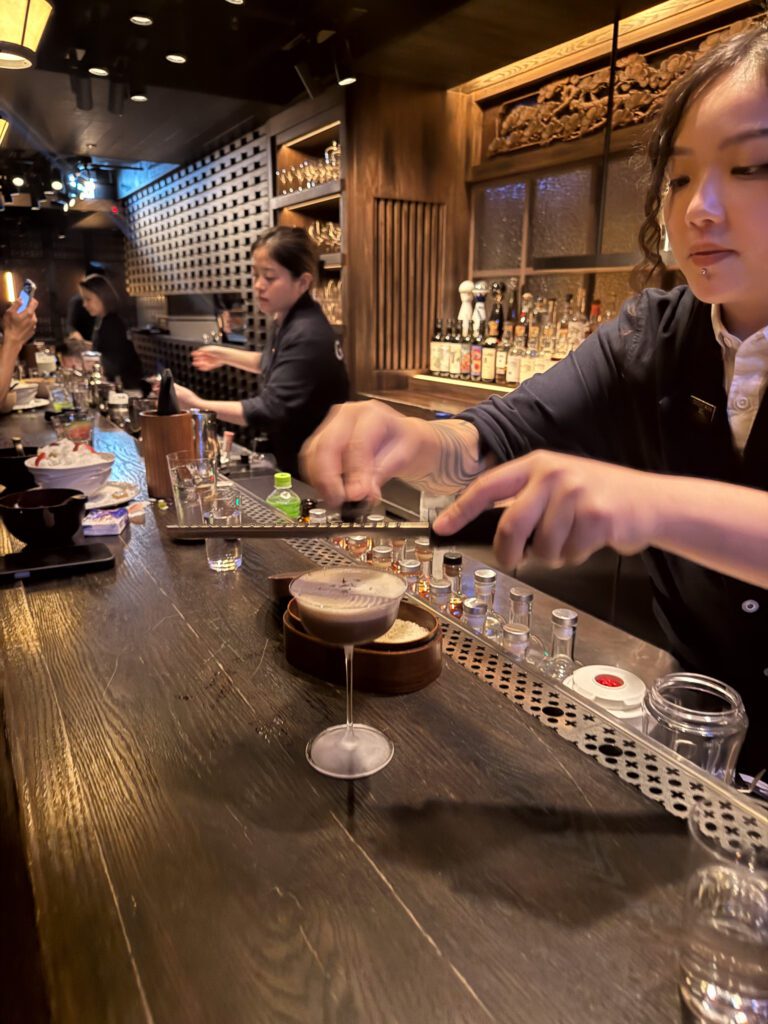 Bartender preparing a craft cocktail at Gokan bar in Central Hong Kong