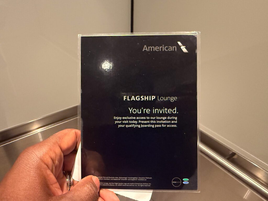 American Airlines Flagship Lounge invitation card for premium cabin access