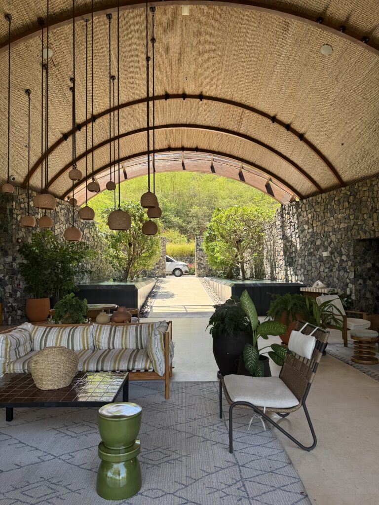 Open-air lobby entrance at Andaz Papagayo Costa Rica with modern design and hanging lights