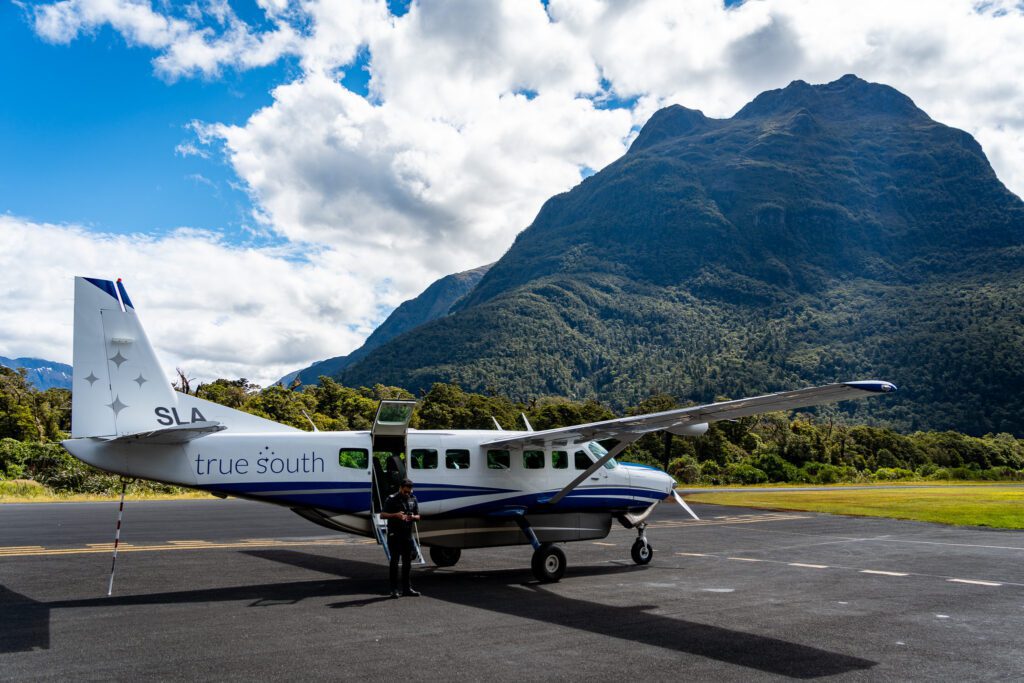 True South scenic flight plane parked at Milford Sound airstrip in Fiordland National Park