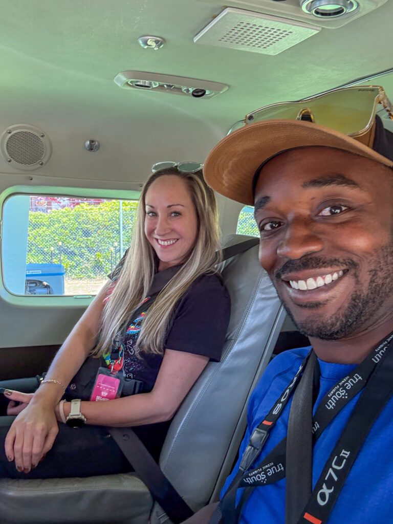 Passengers seated inside small plane before a Milford Sound scenic flight