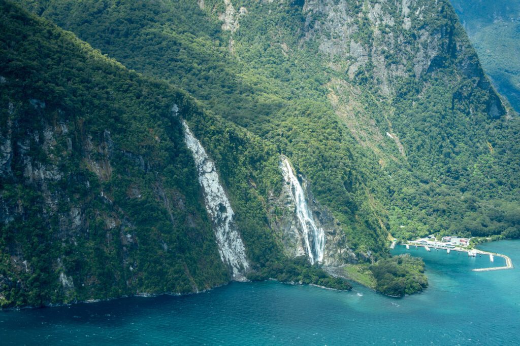 Waterfall cascading into Milford Sound near the cruise dock in Fiordland National Park