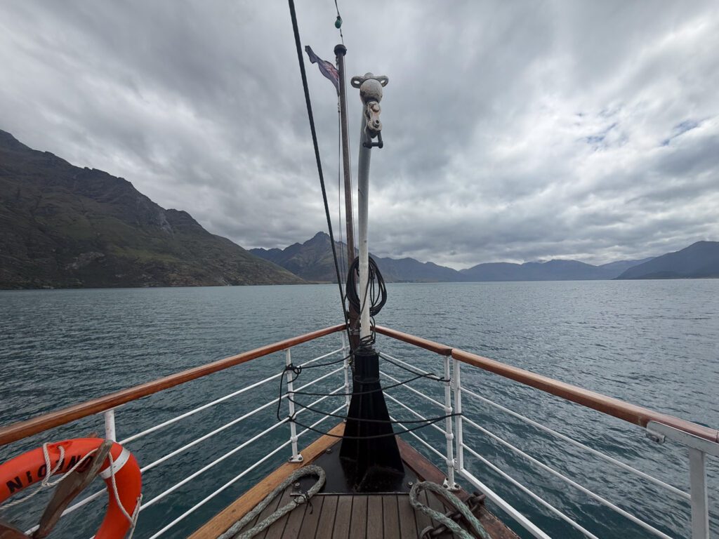 View from the front of the TSS Earnslaw looking out over Lake Wakatipu and surrounding mountains
