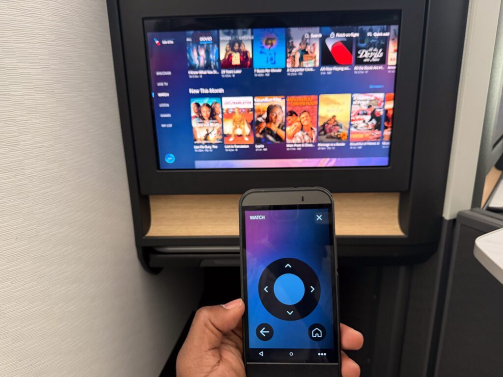 American Airlines business class inflight entertainment remote control and screen on 787-9