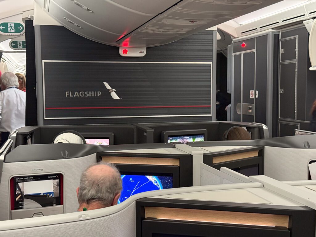 American Airlines flagship business class cabin on 787-9 with front bulkhead view