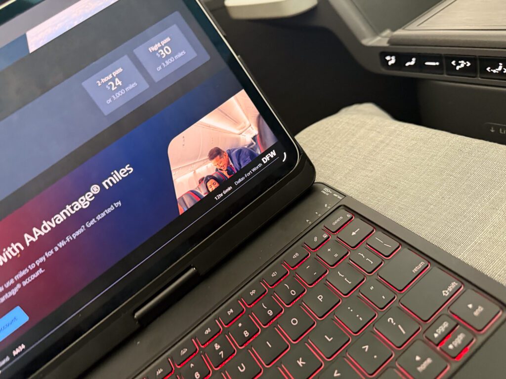 American Airlines 787-9 business class WiFi and laptop setup during flight