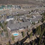 Grand Hyatt Vail ski-in ski-out resort in Cascade Village with heated pool and Gore Creek in Vail, Colorado