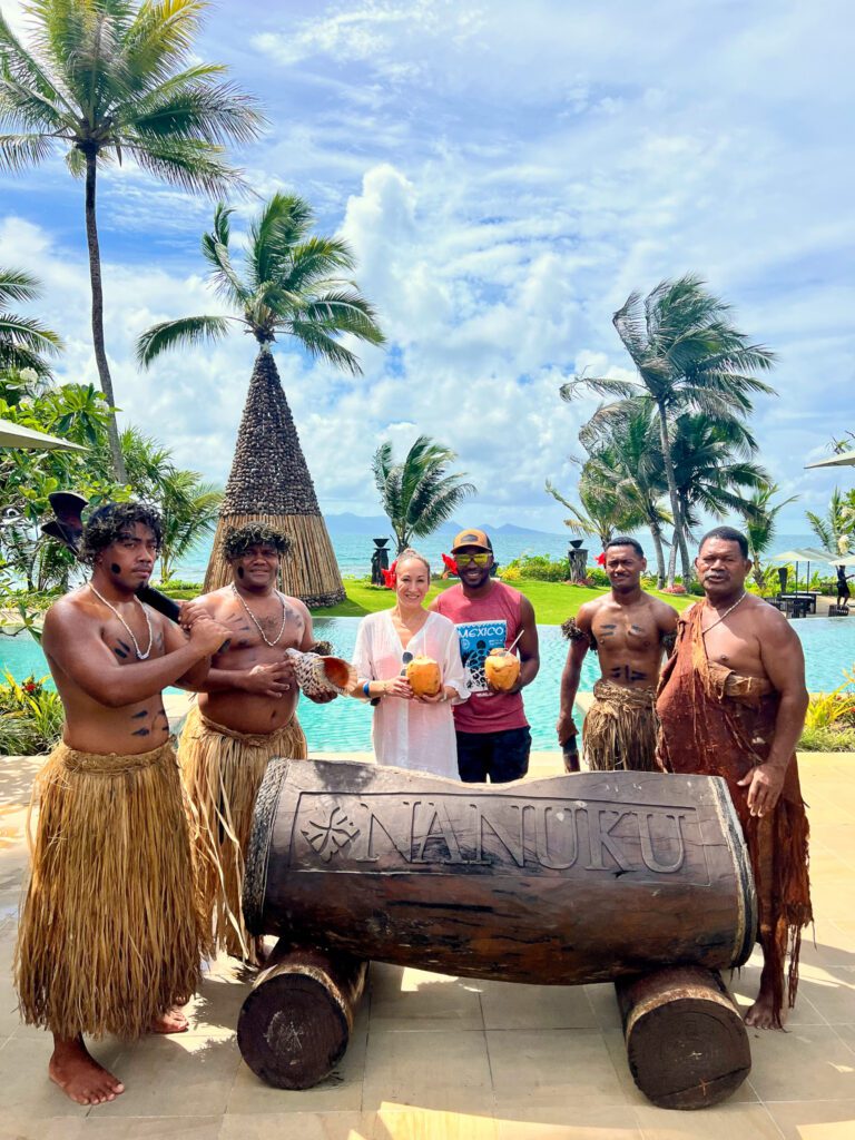 Traditional Fijian welcome ceremony at Nanuku Resort Fiji with local cultural performers