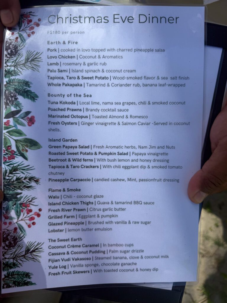 Nanuku Resort Fiji Christmas Eve dinner menu featuring seafood, lobster, and traditional Fijian dishes