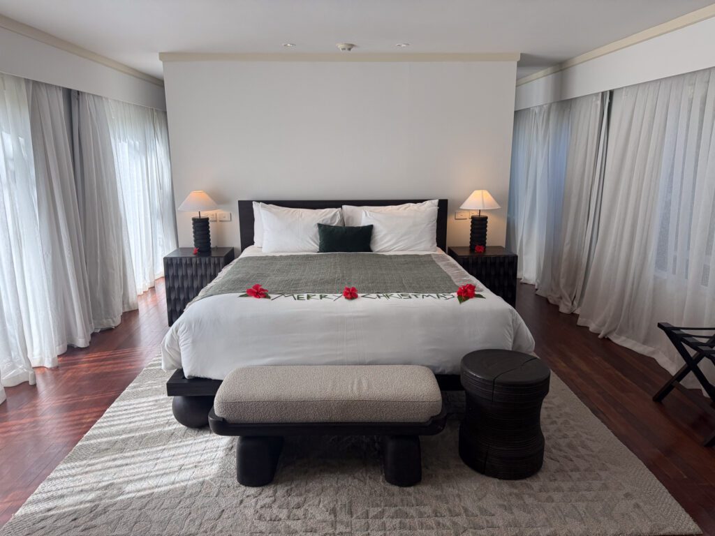 Spacious king bedroom inside luxury pool villa at Nanuku Resort Fiji