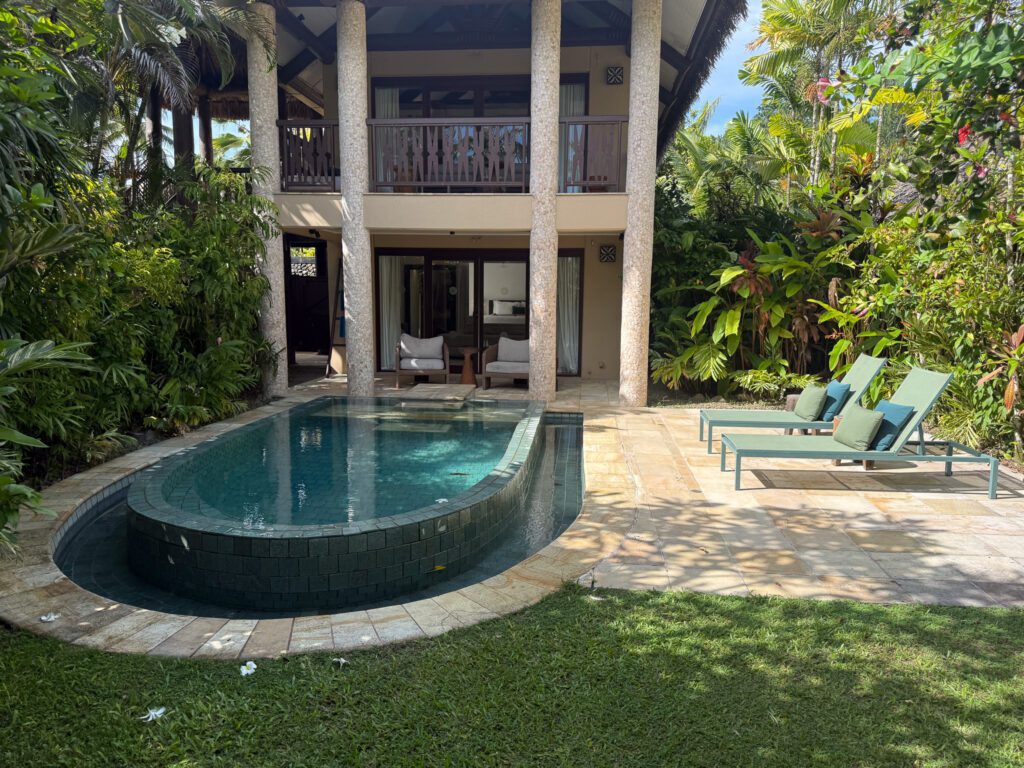 Exterior view of private pool villa at Nanuku Resort Fiji surrounded by tropical gardens