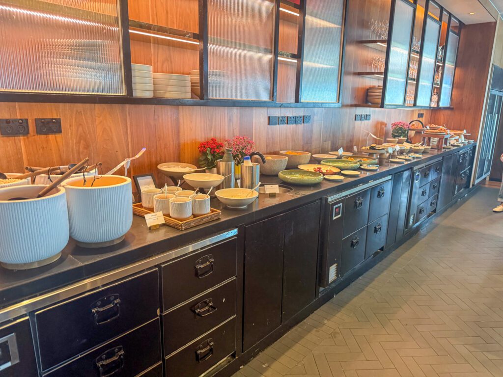 Breakfast buffet selection at Onemata restaurant in Park Hyatt Auckland featuring fresh fruit, pastries, cereals, and continental breakfast offerings